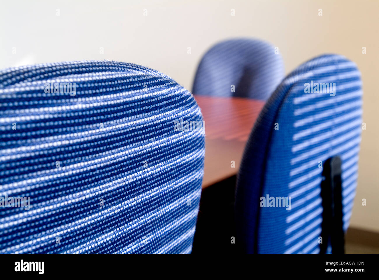 Shadow patterns on conference room table and chairs Stock Photo - Alamy