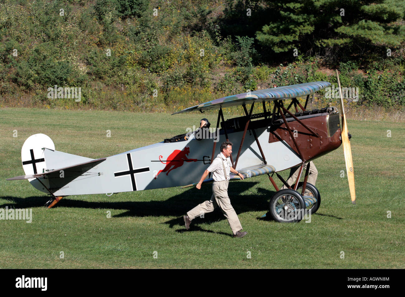 The ground crew around a fokker D VII biplane. Stock Photo