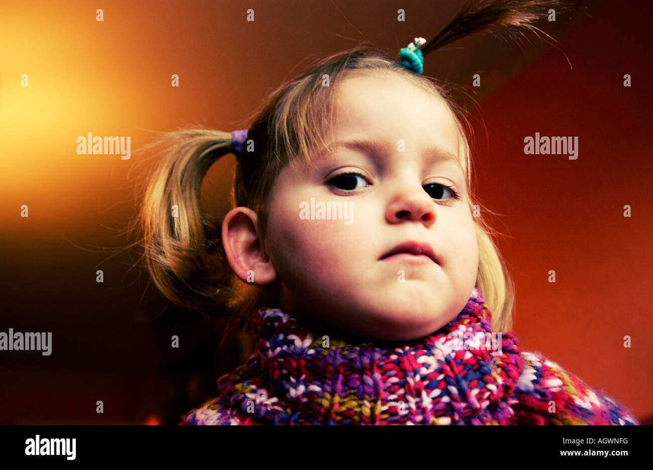 portrait of a cute little girl looking at camera Stock Photo - Alamy