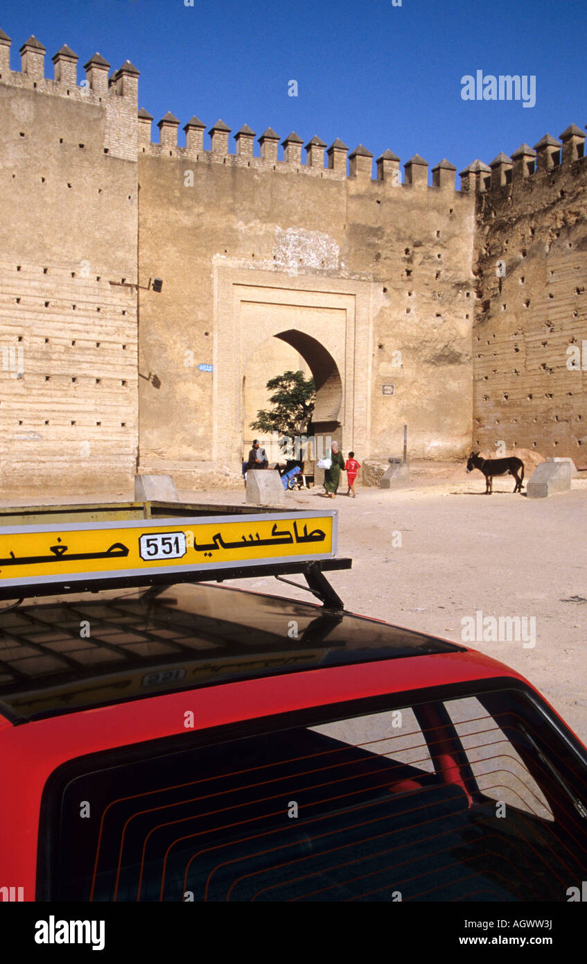 A petit taxi by the Bab Ain Zleten Gate in Fes Morocco Stock Photo