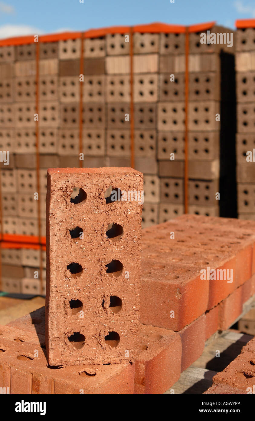 Red brick pile stack in builders merchant supplier yard Stock Photo