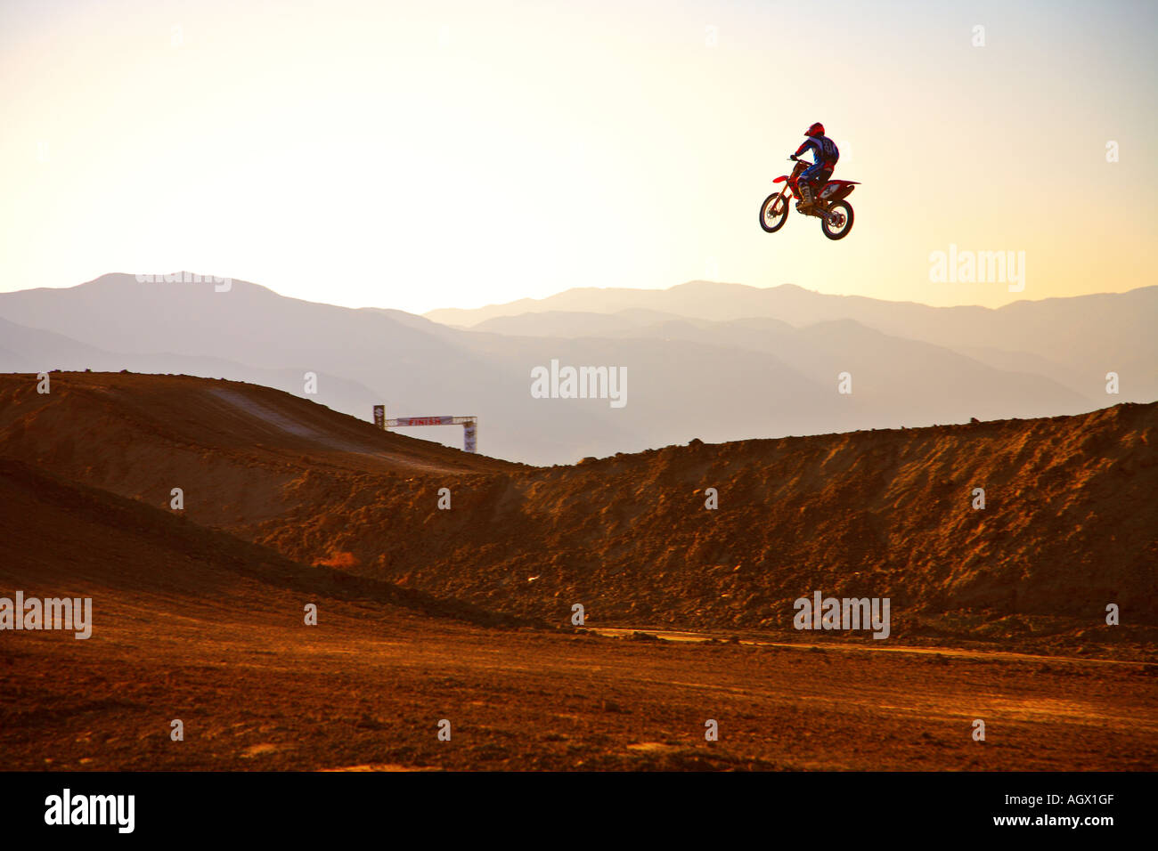 Motocross Rider Jumping At The Lake Elsinore Motocross Park, Lake Esinore,  Riverside County, California, United States, USA, Stock Photo