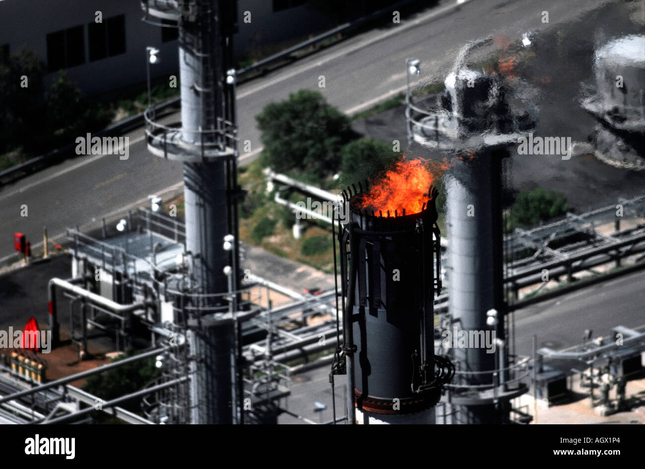 Aerial photo of Gaviota Oil and Gas Plant in Goleta, California with fire from exhaust tower. Stock Photo