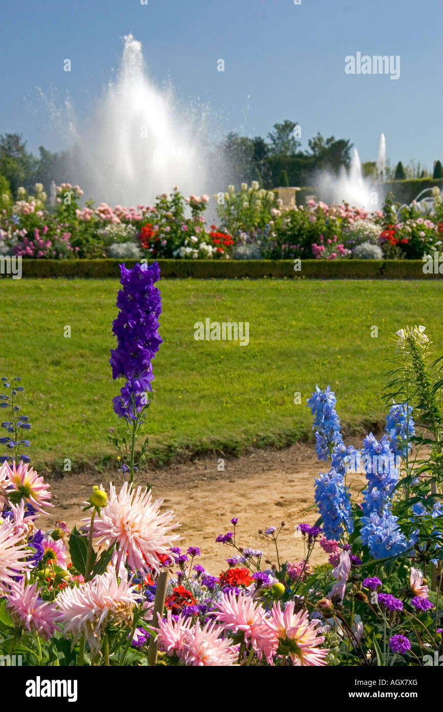 Flowers and fountains in the formal gardens at The Palace of Versailles