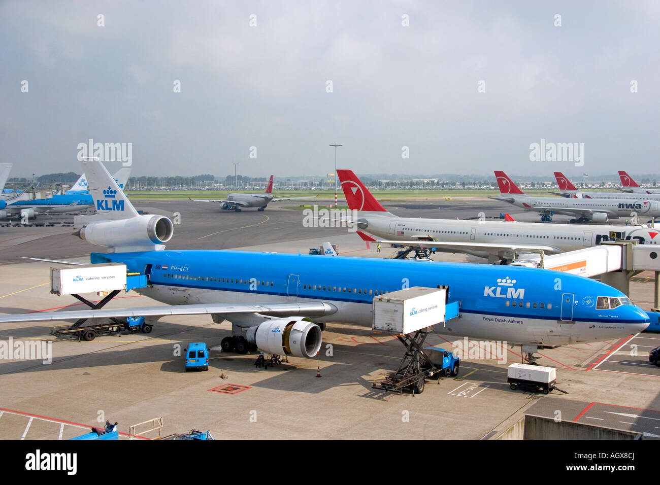 Airplanes at the Schiphol Airport in Amsterdam Netherlands Stock Photo