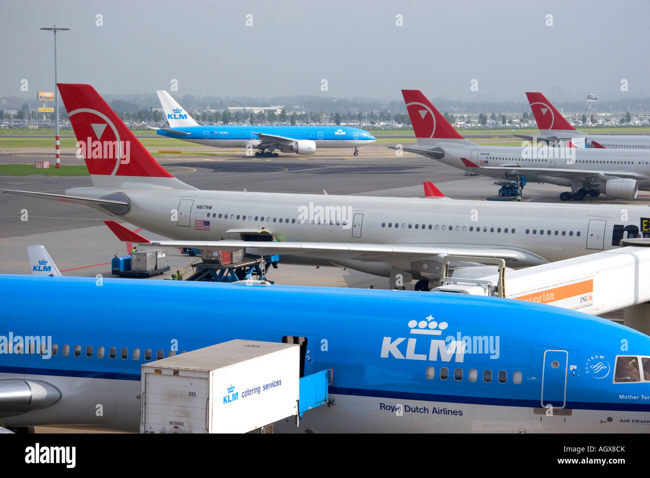 Airplanes at Schiphol Airport in Amsterdam Netherlands Stock Photo