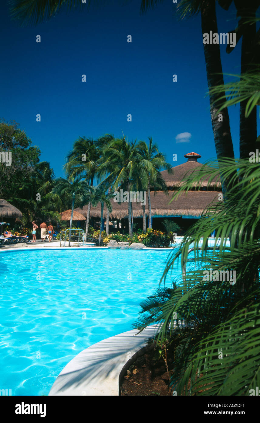 Swimming pool and bar restaurant in the ground of the Riu Tequila hotel ...