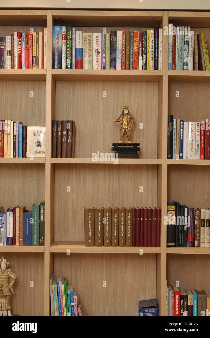 Book shelves with books in English Russian and Hebrew Stock Photo Alamy