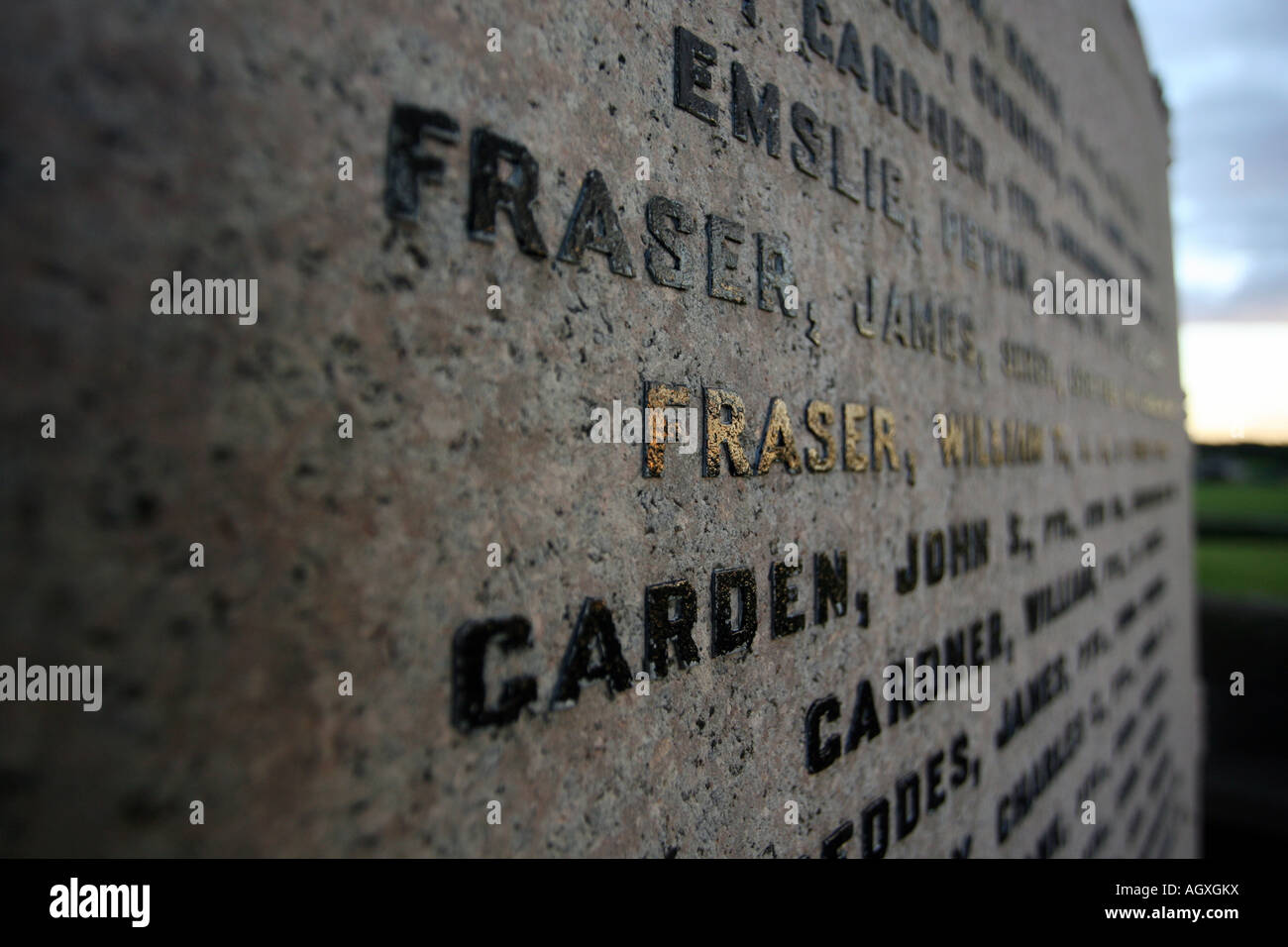 Names of the dead written on a memorial stone to military soldiers who