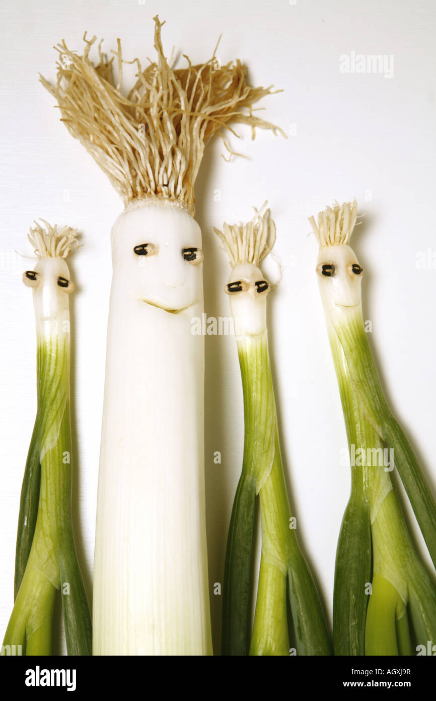 Funny green spring onions. Still-life Stock Photo - Alamy