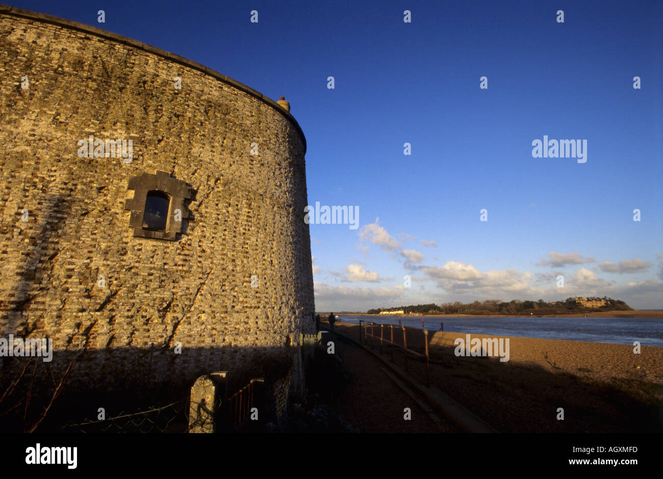 Low winter s sun reflecting off the brick work off one of the Martello Towers at Felixstowe Ferry Suffolk England Stock Photo