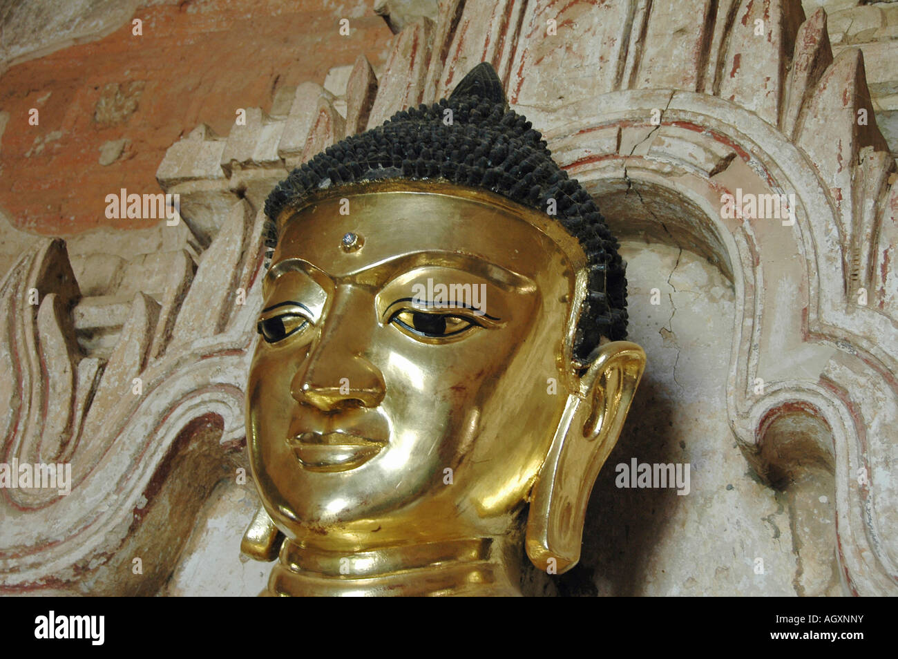 Myanmar Bagan Pagoda temple golden statue of a sitting Buddha Stock ...