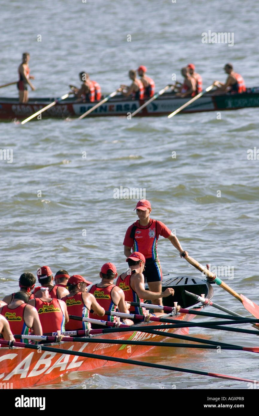 Traineras teams take a break during regatta off Puerto Viejo de Algorta Basque Country Spain Stock Photo