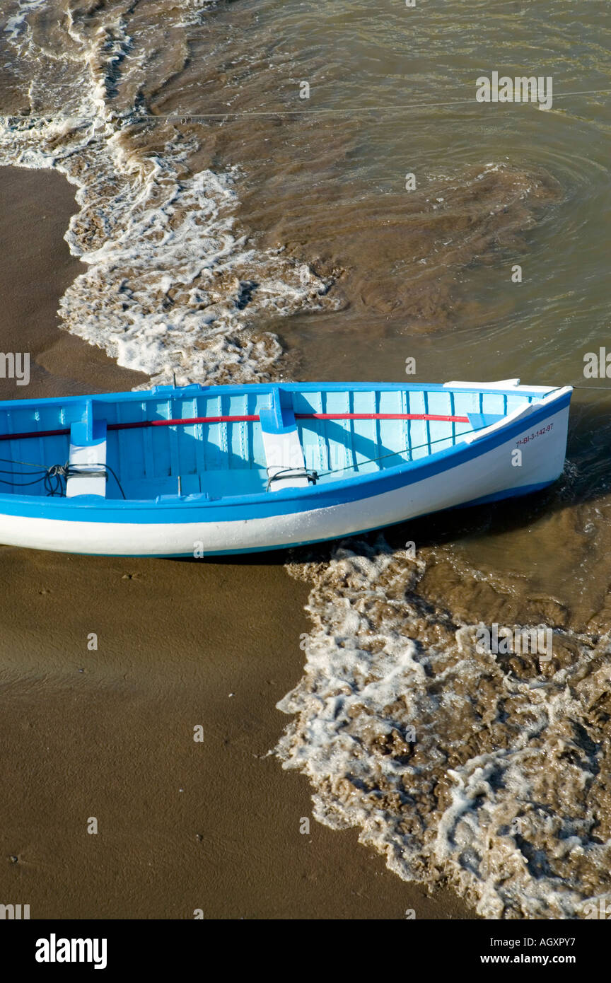 Blue and white rowing boat at mooring in harbour Puerto Viejo de Algorta Basque Country Spain Stock Photo
