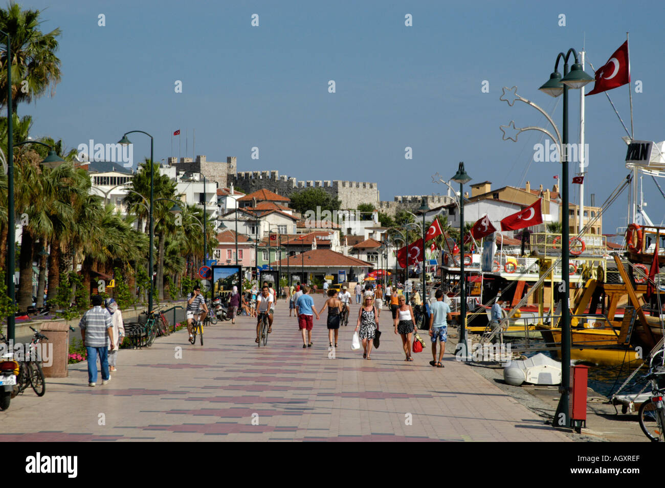 people strolling along the waterfront promenade marmaris turkey AGXREF
