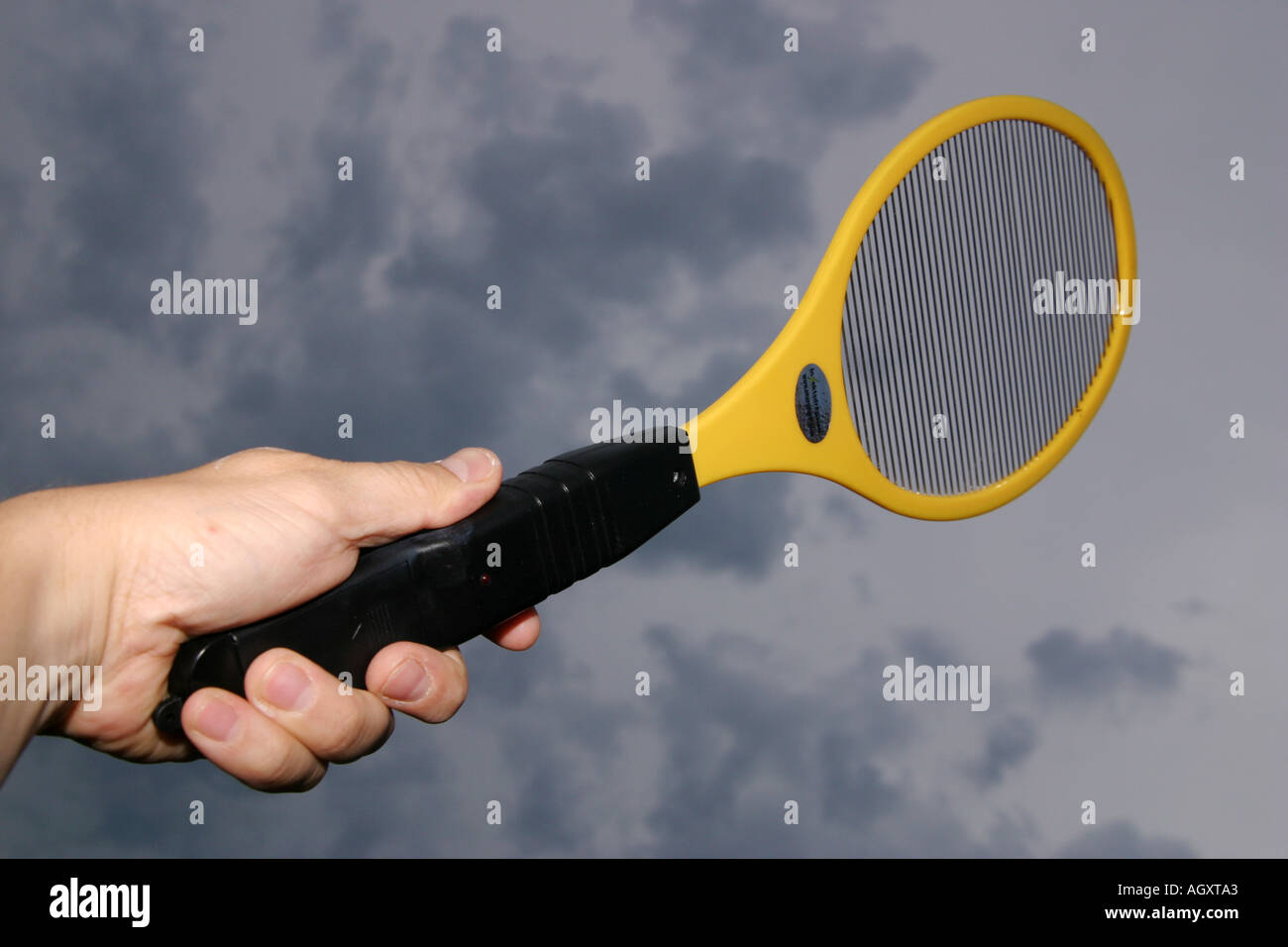 Tennis racket looking tool to electrocute insects Stock Photo