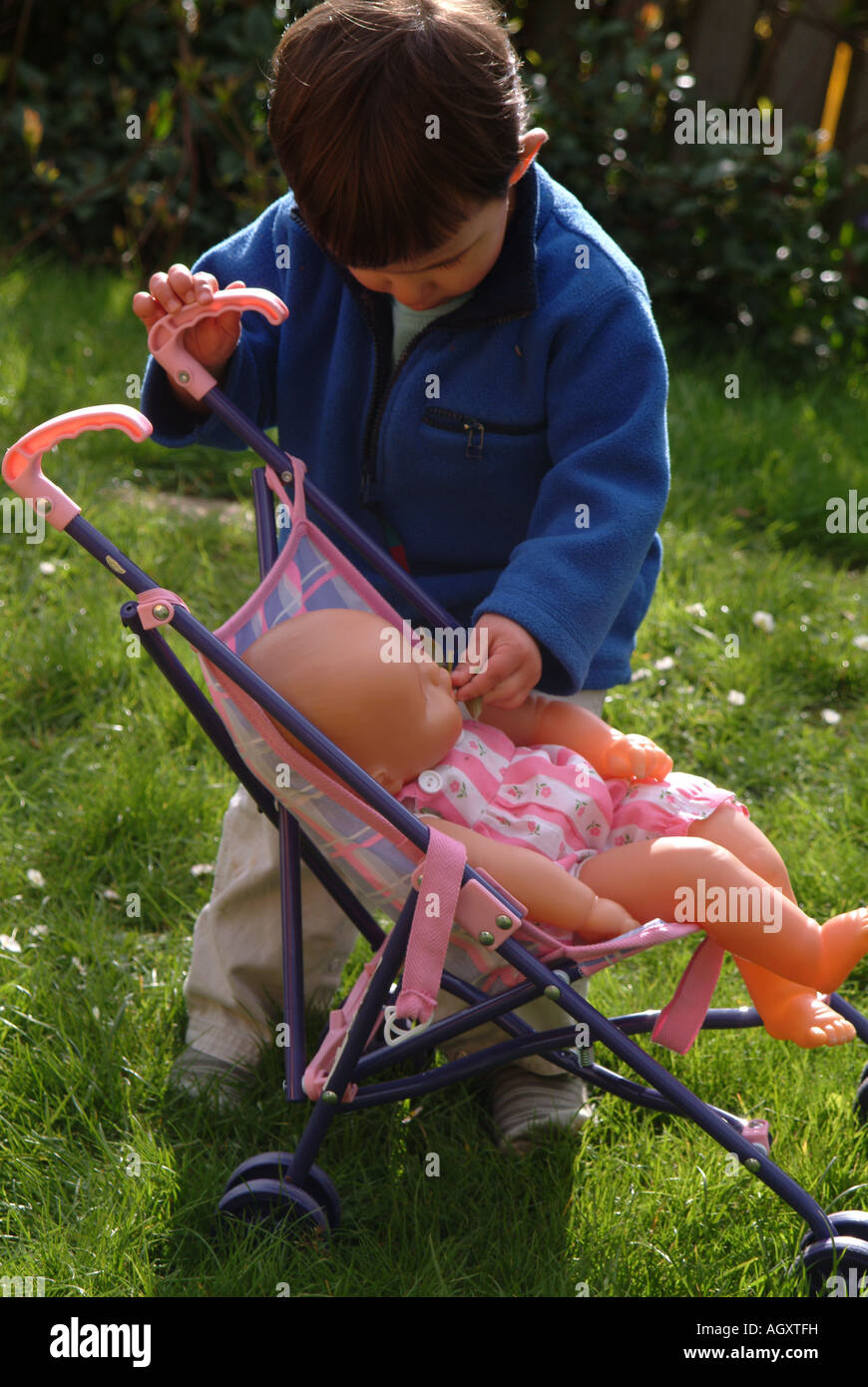 boys play pushchair