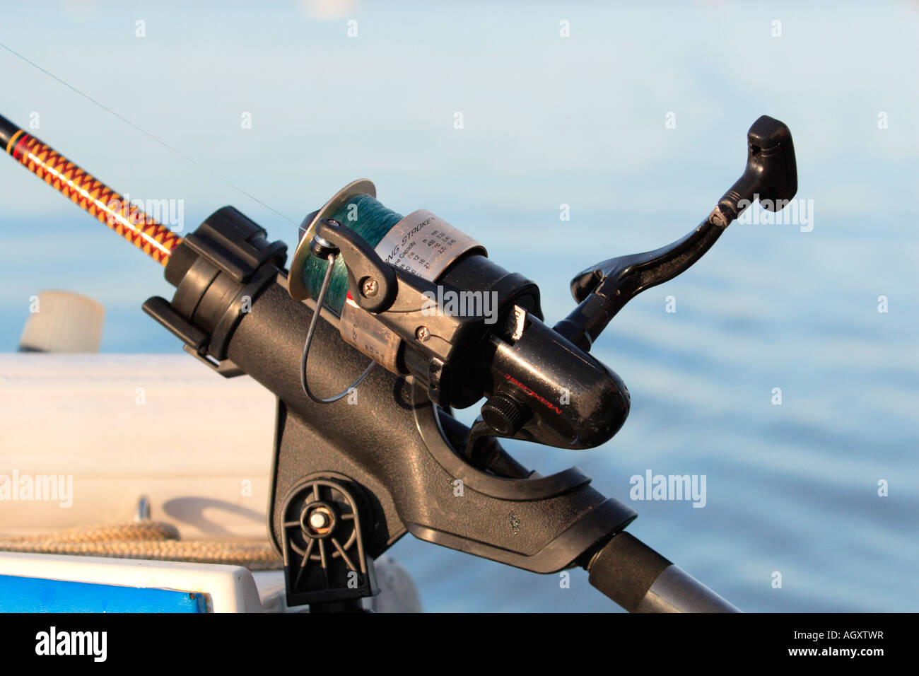 Rod reel in rod holder hi-res stock photography and images - Alamy