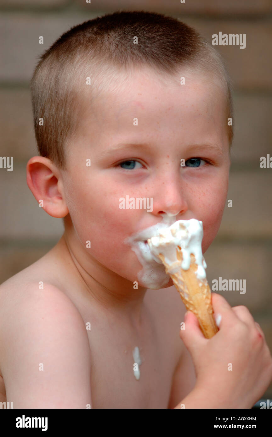 Young Boy Eating Ice Cream Stock Photo Alamy