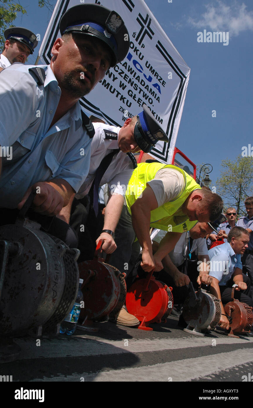 Policeman durin protest of polish uniformed services in Warsaw against bad working conditions and low pay Stock Photo