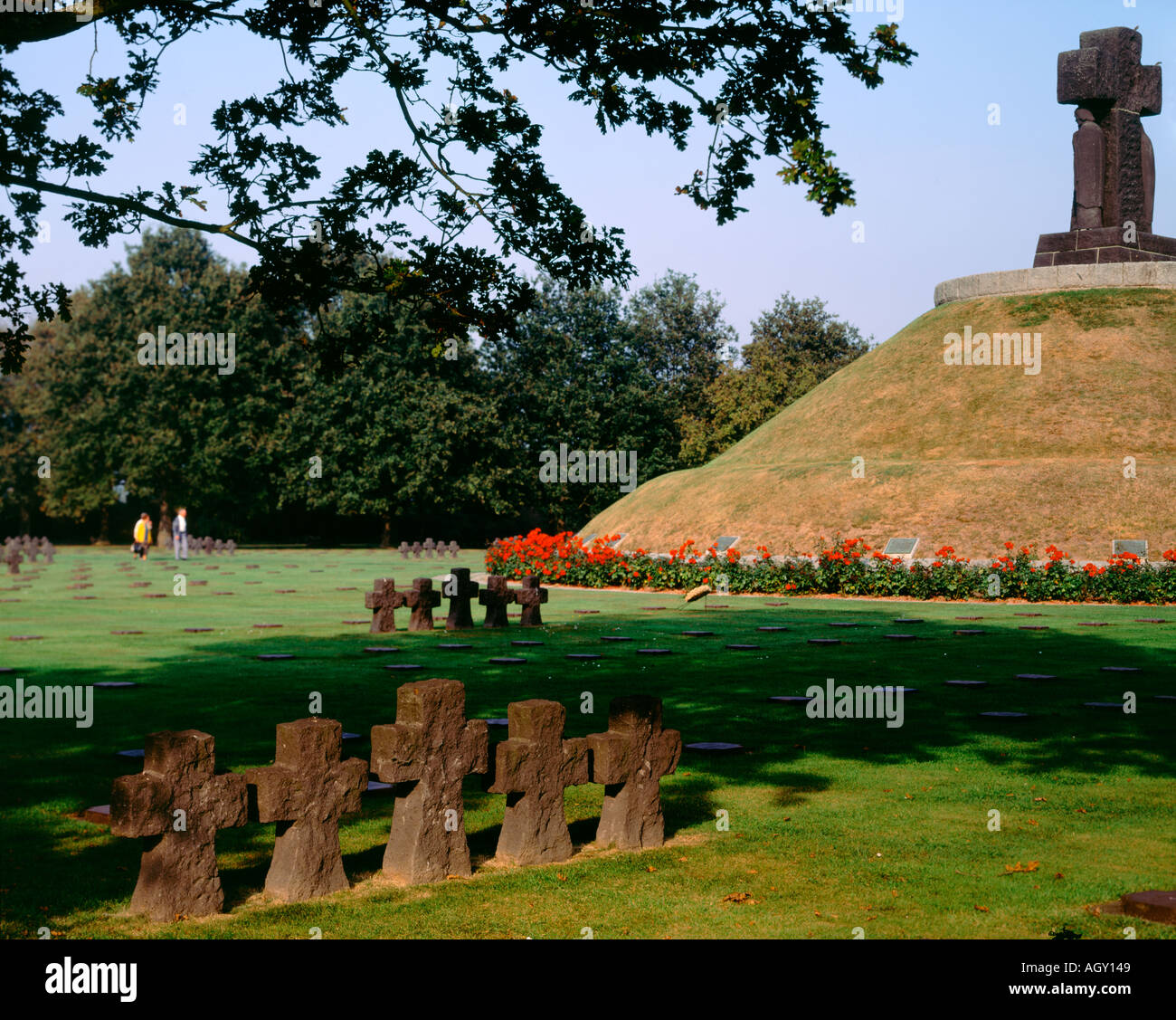 Granite gravestones and the memorial mound at the German Military Cemetary La Cambe Calvados Normandy France Stock Photo
