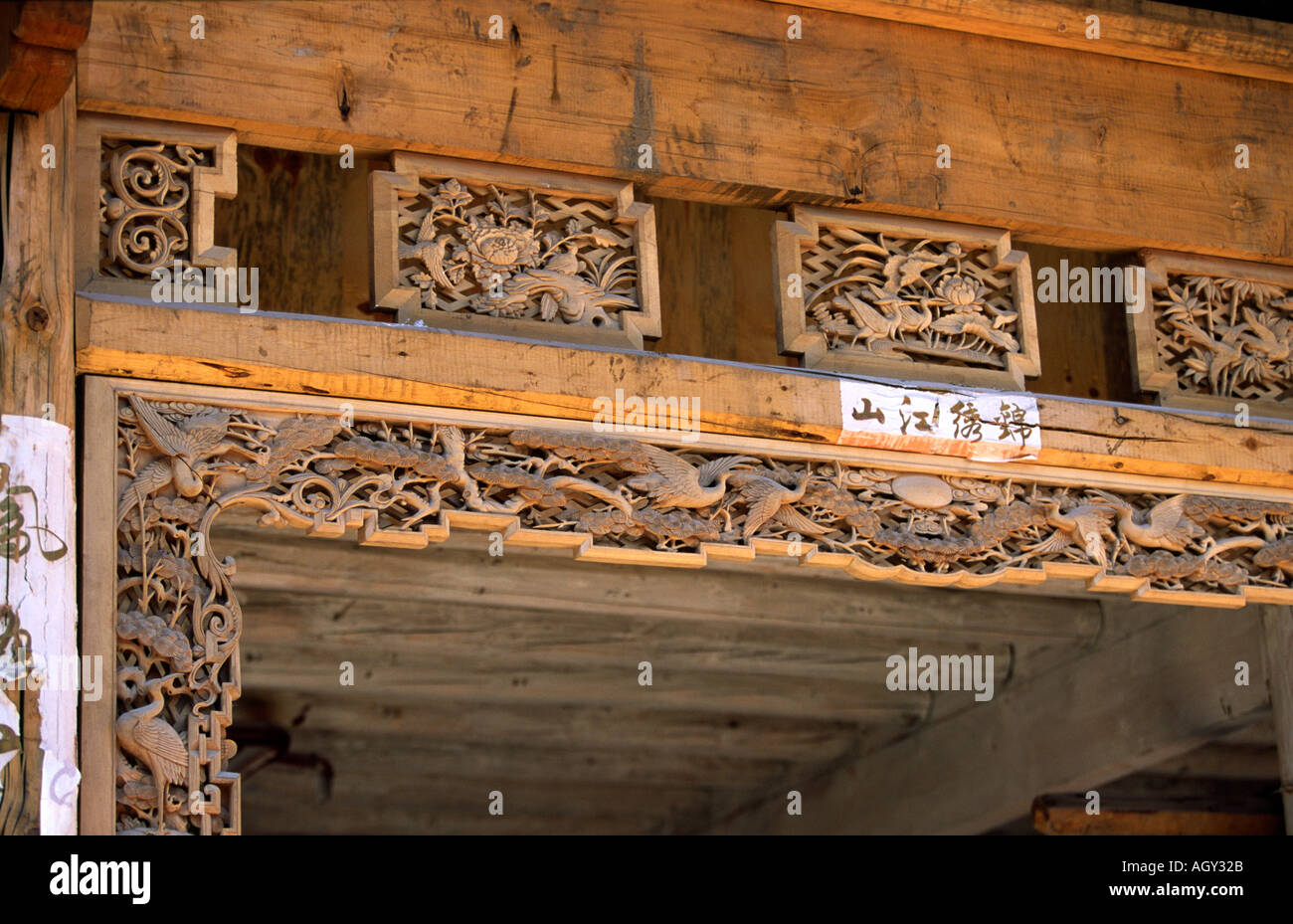 China Yunnan Lijiang Crafts carved wooden door frame decoration Stock