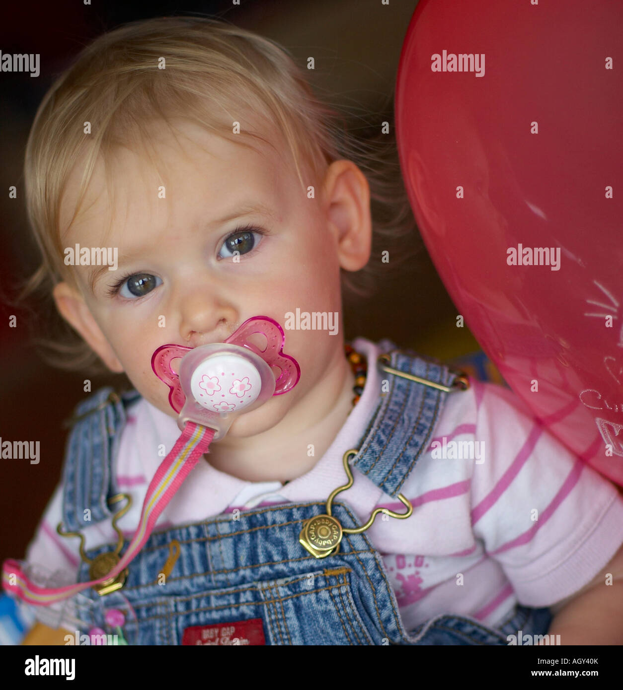 baby with comforter Stock Photo Alamy