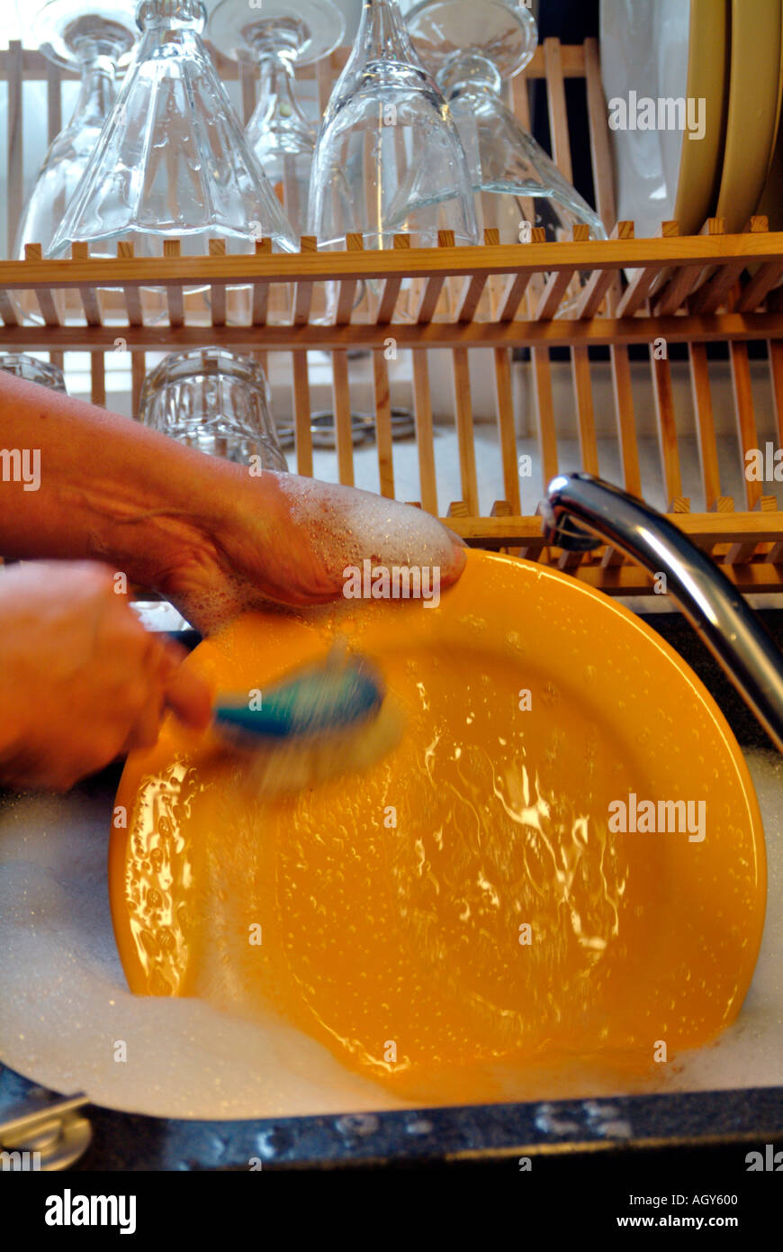 kitchen work doing the dishes Stock Photo