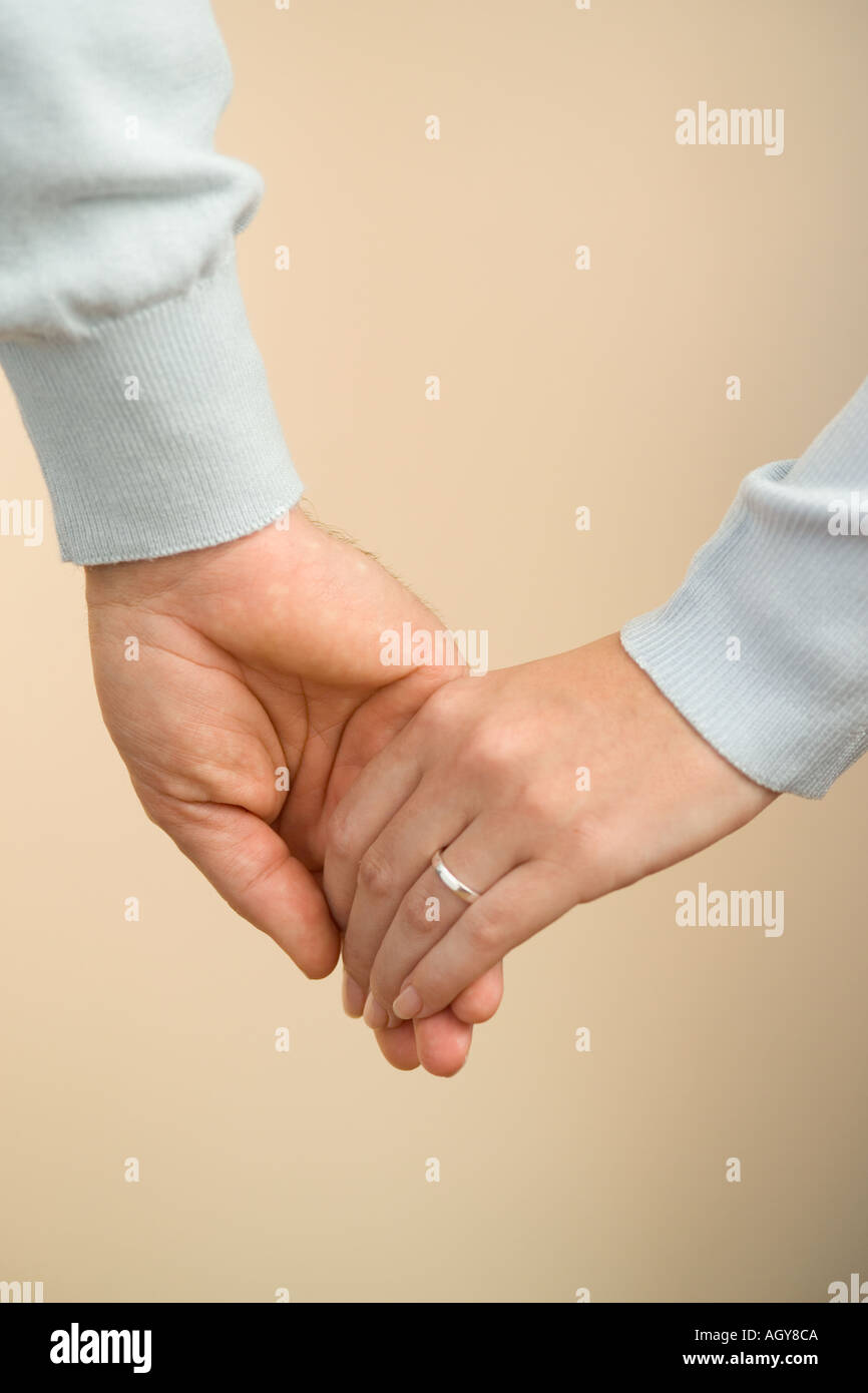 Husband and wife hold hands rings hires stock photography and images Alamy