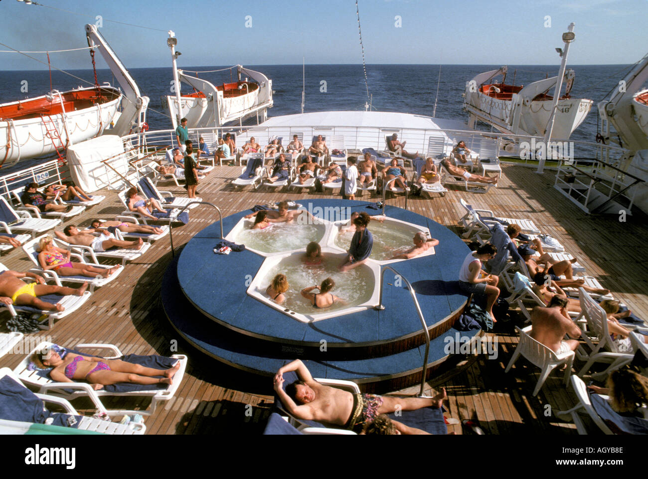 Sunning and tanning is one activity aboard a cruise ship Stock Photo