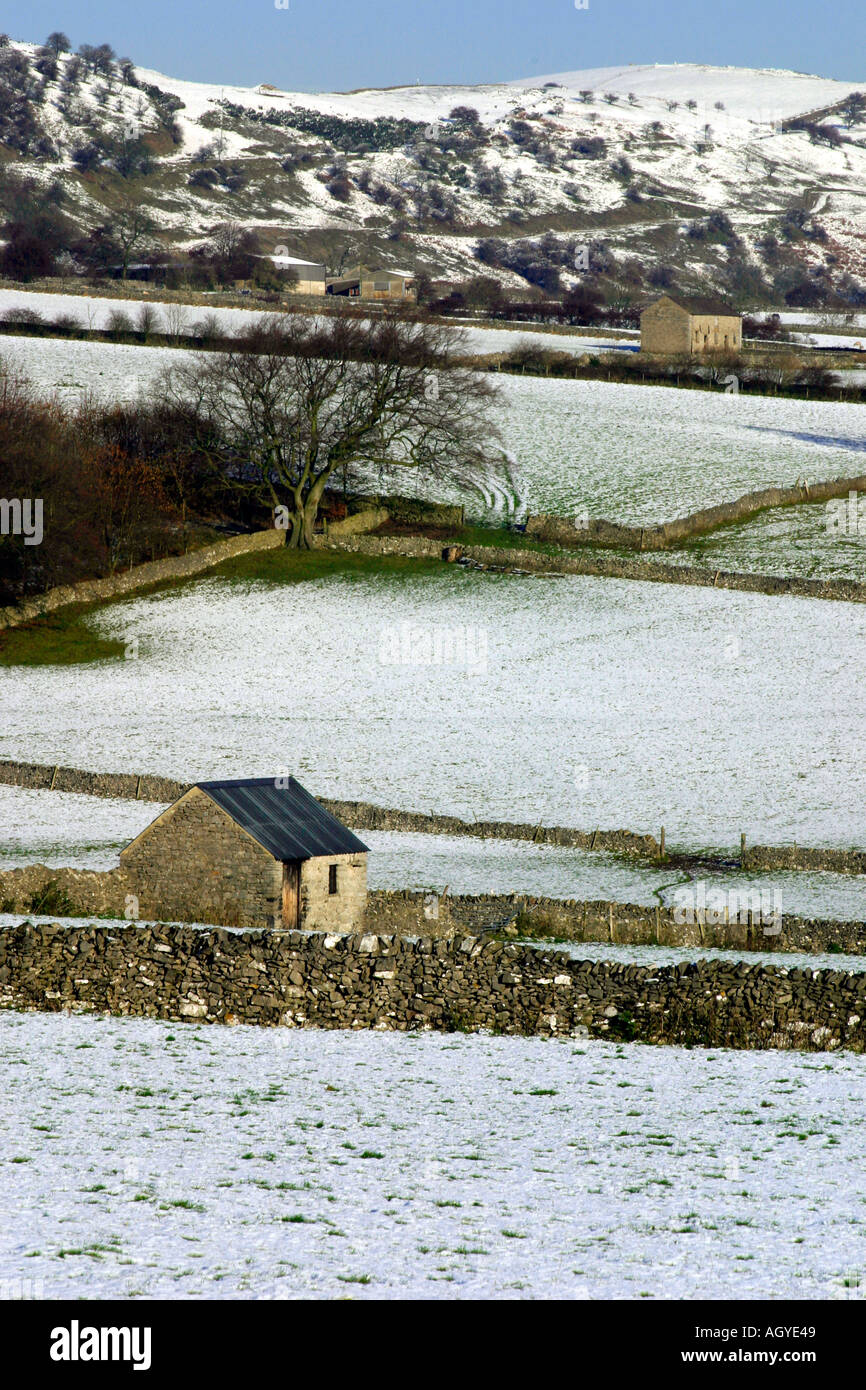 Snow covered landscape near Monsal Head in the Derbyshire Peak District England Stock Photo