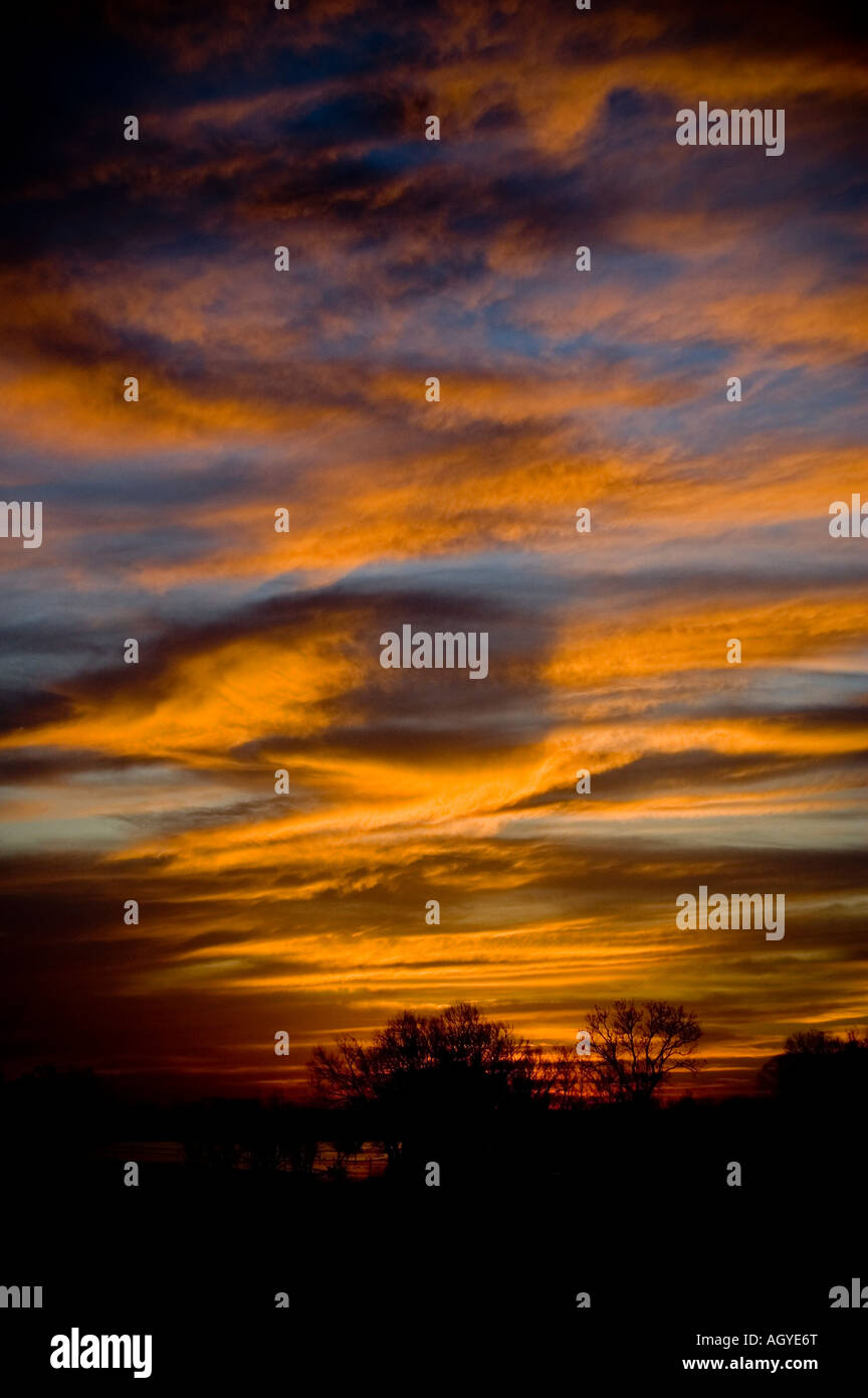 Beautiful sunset with orange clouds at dusk Stock Photo - Alamy