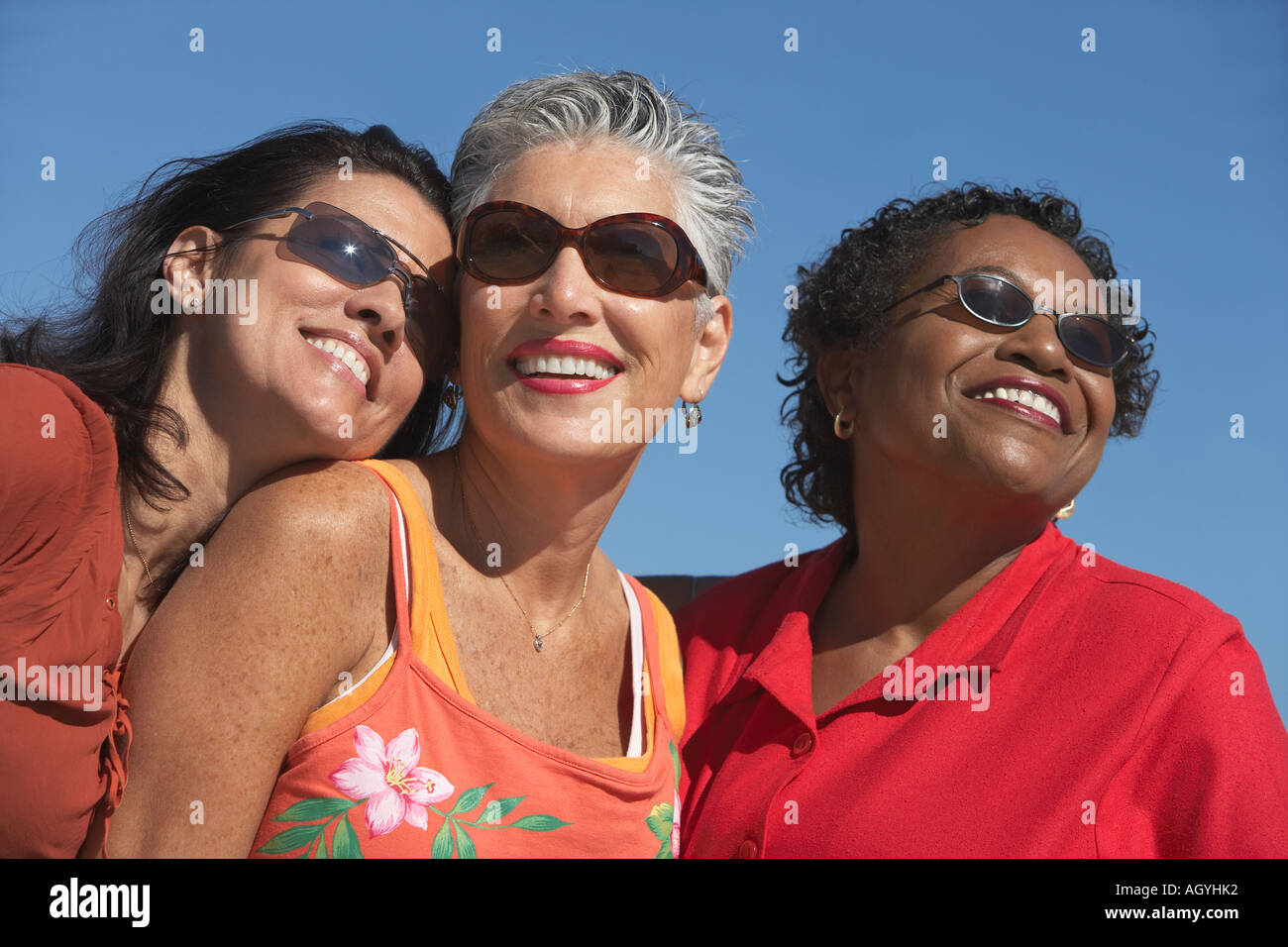 Three smiling women hi-res stock photography and images - Alamy