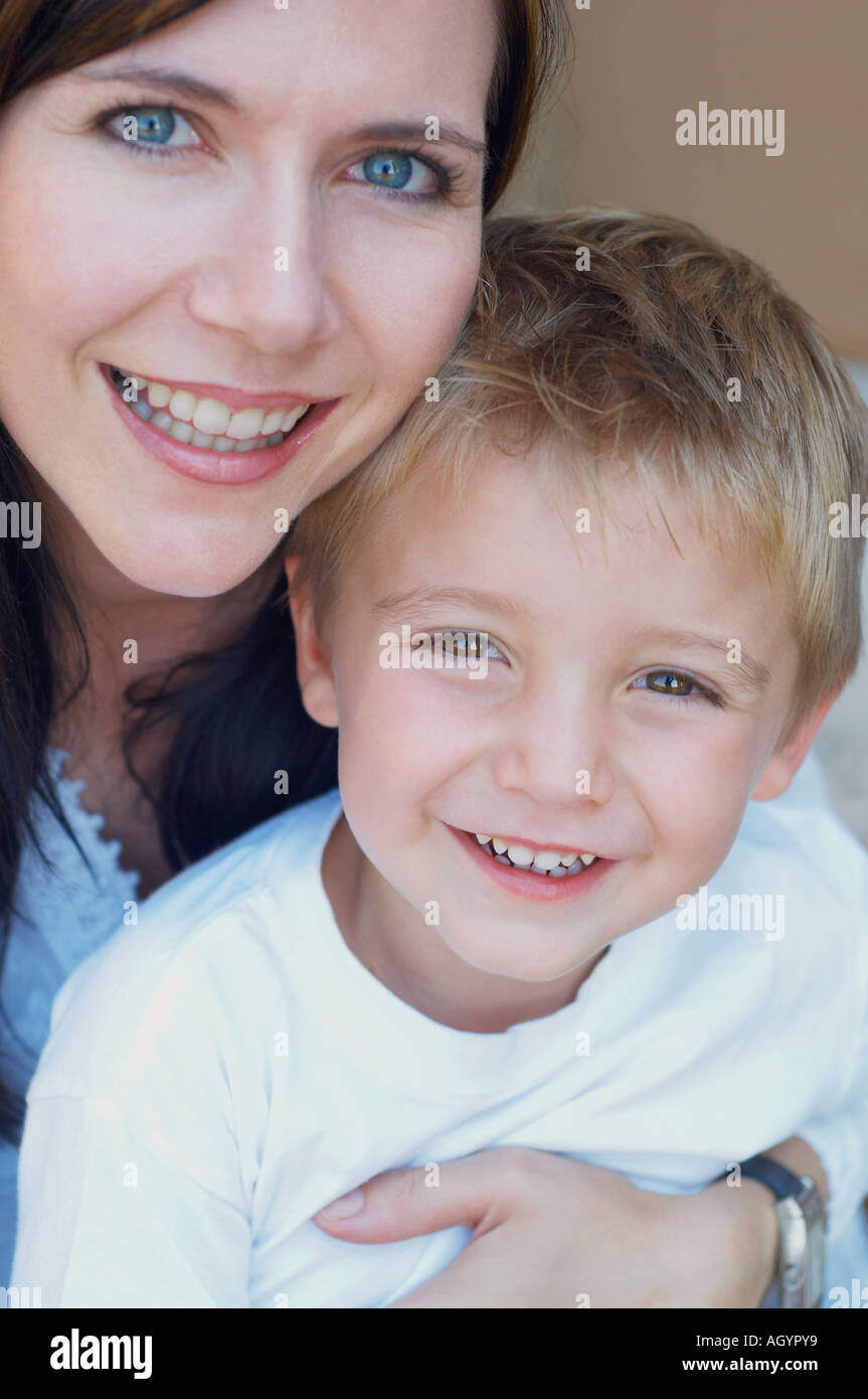 Mother and young son hugging Stock Photo