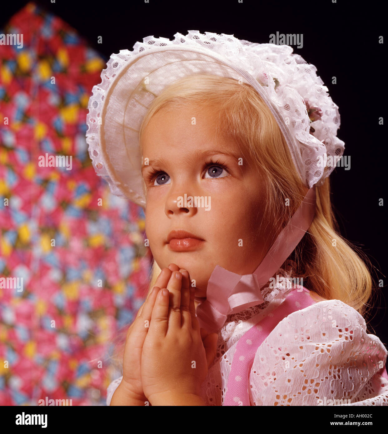 small girl praying in church Stock Photo