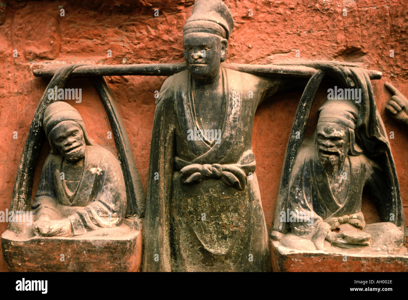 Medieval Buddhist cave art at Dazu China 3 Stock Photo