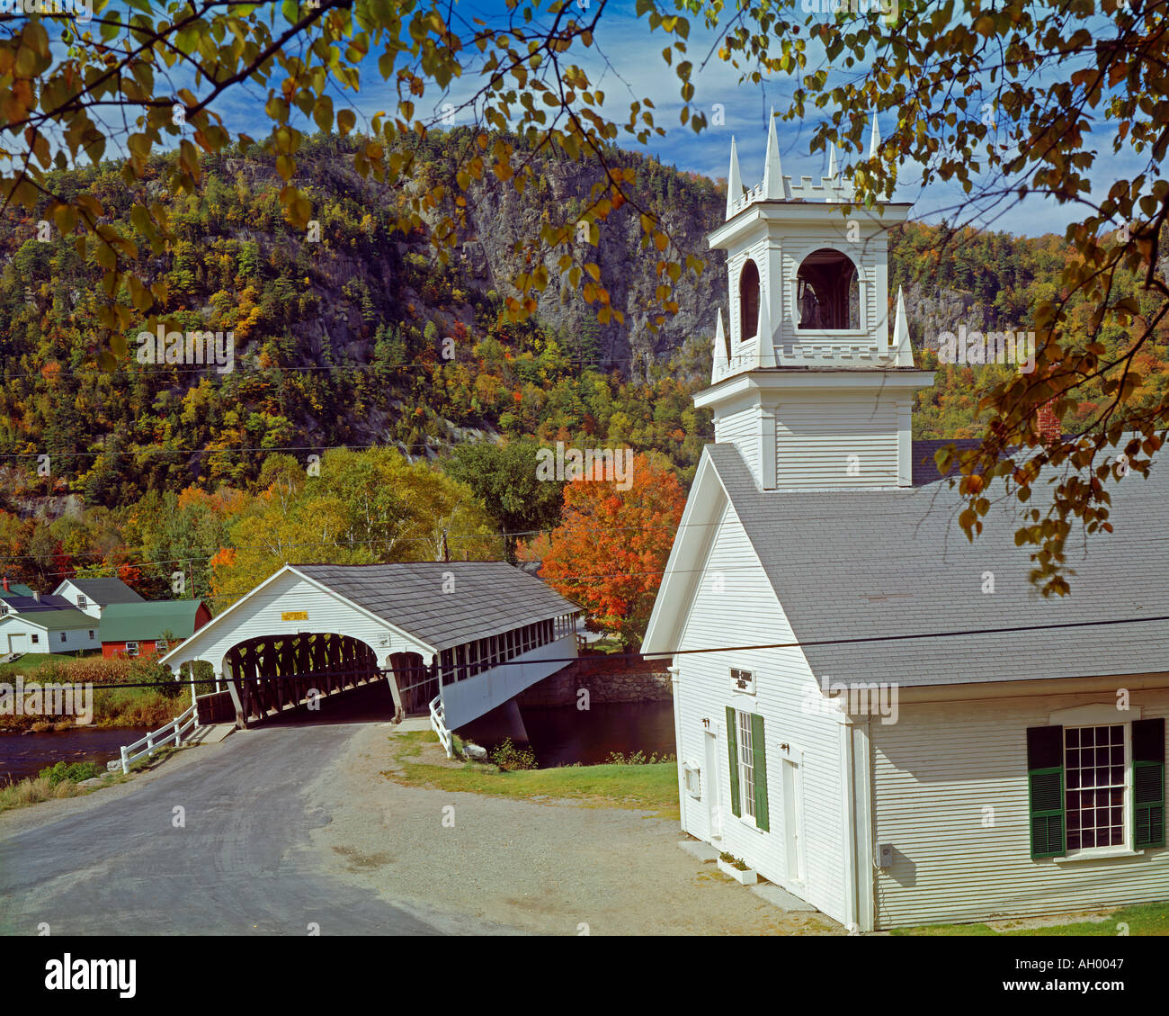Covered bridge and church at Stark New Hampshire USA Stock Photo