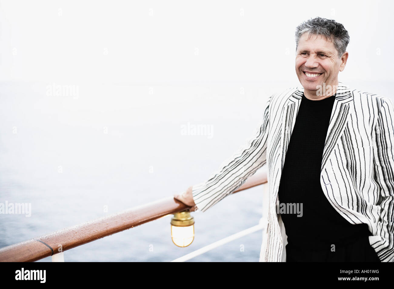 Older man on his sailing ship hi-res stock photography and images - Alamy