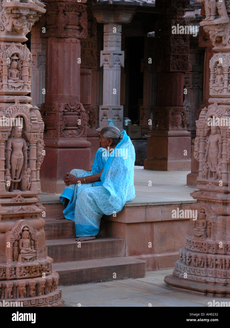 Old woman in Jain temple India Rajasthan Ossian Stock Photo