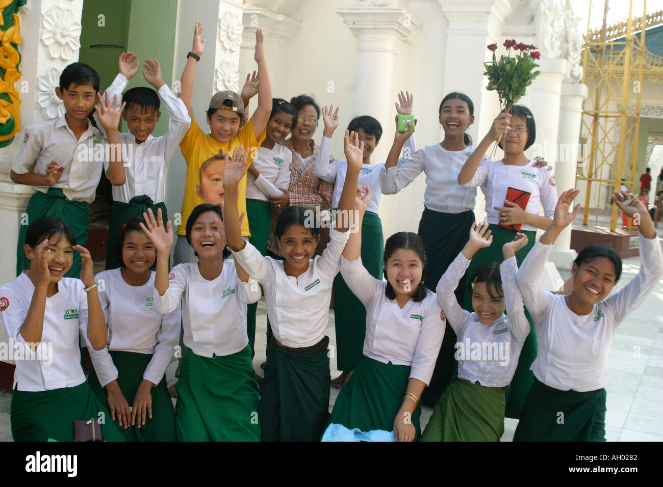 excited,happy Burmese Schoolchildren on an outing to the Shwedagon pagoda  in Yangon Rangoon Myanmar Burma Wearing school uniform Stock Photo - Alamy