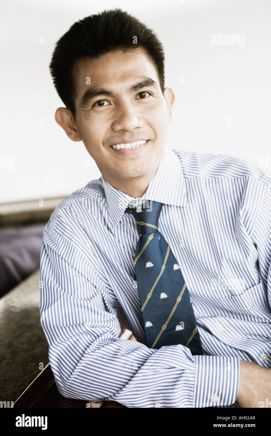 Portrait of a young man smiling Stock Photo - Alamy