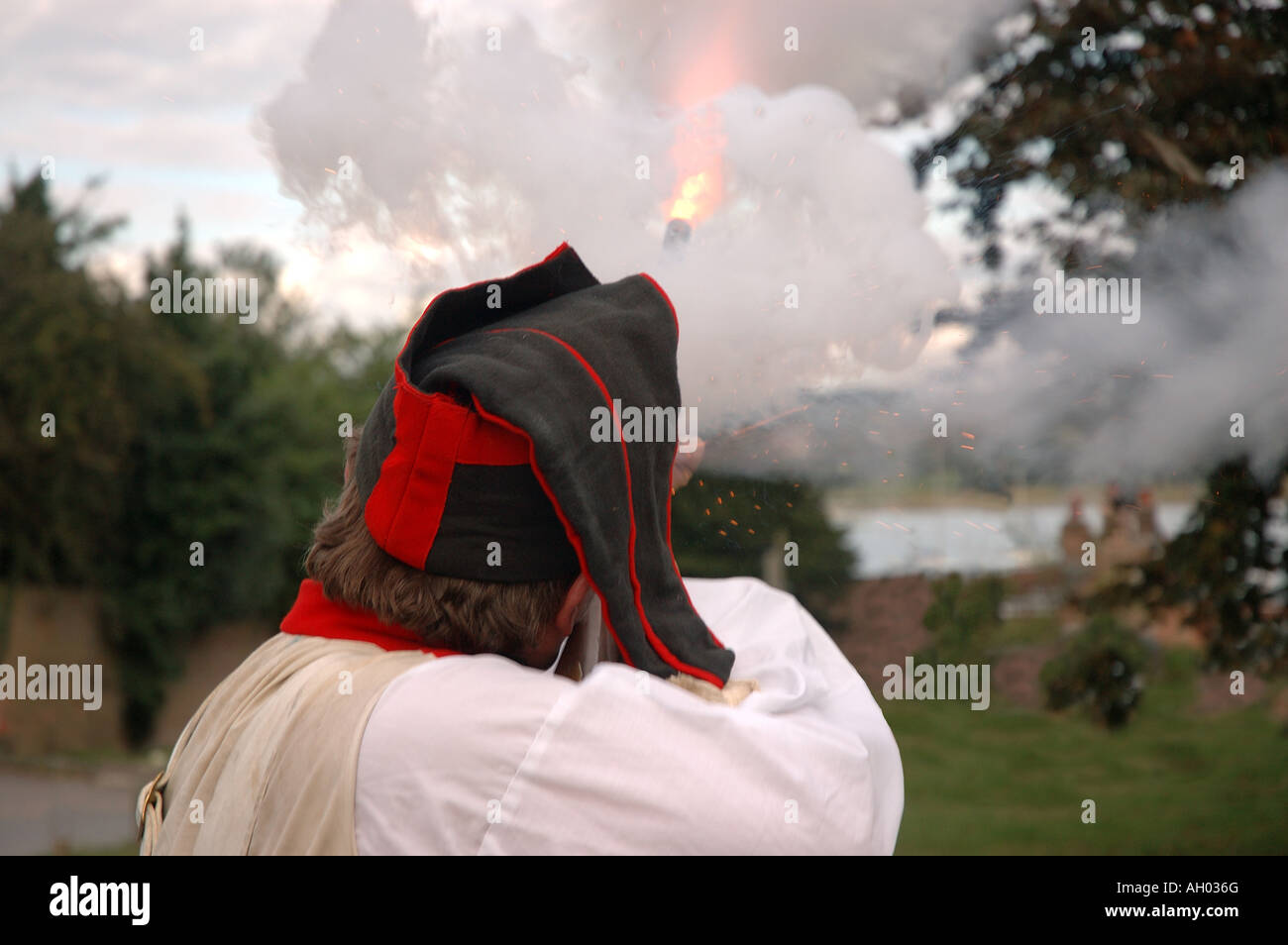 Napoleonic Re-enactment Soldier Firing Musket Stock Photo
