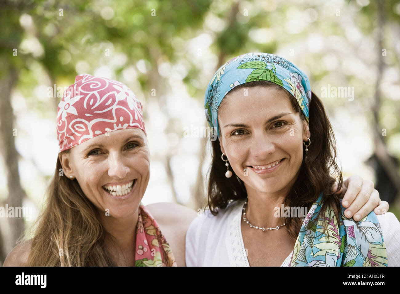 Portrait of two mid adult women smiling Stock Photo