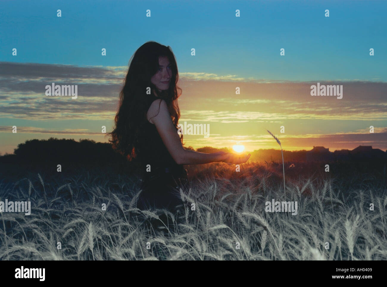 A woman is holding the Sun in her hands Altai Russia Stock Photo - Alamy