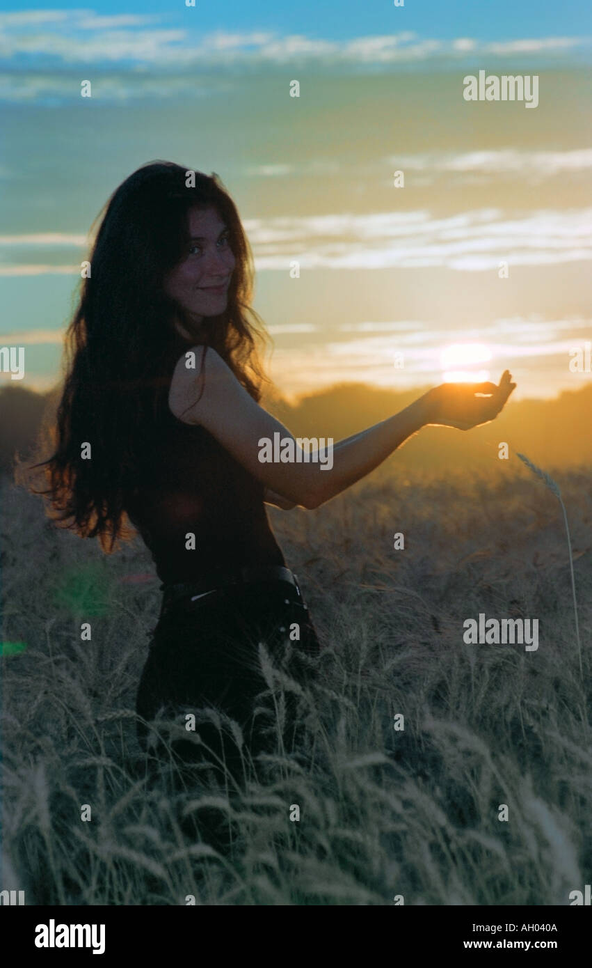 A woman is holding the Sun in her hands Altai Russia Stock Photo - Alamy