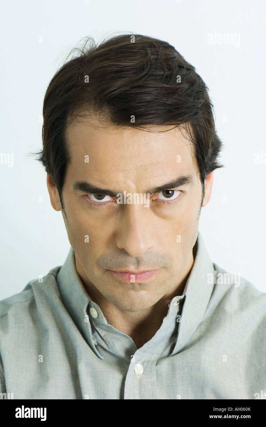 Man glaring at camera, portrait Stock Photo Alamy
