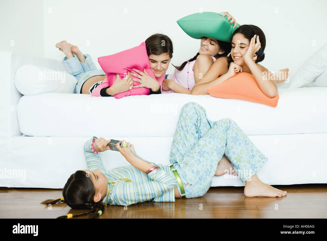 Preteen girl lying on stomach hires stock photography and images Alamy