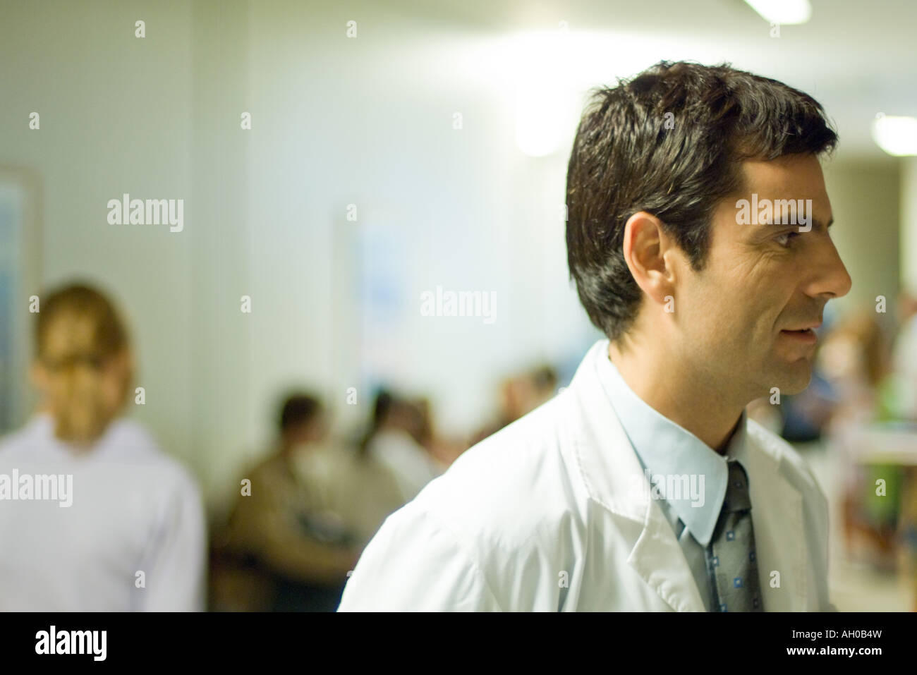 Doctor, hospital waiting room in background Stock Photo - Alamy