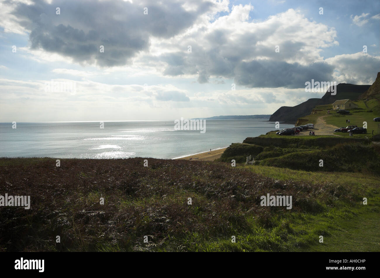 a wide view of a landscape from a cliff top in dorset showing the sea Stock Photo