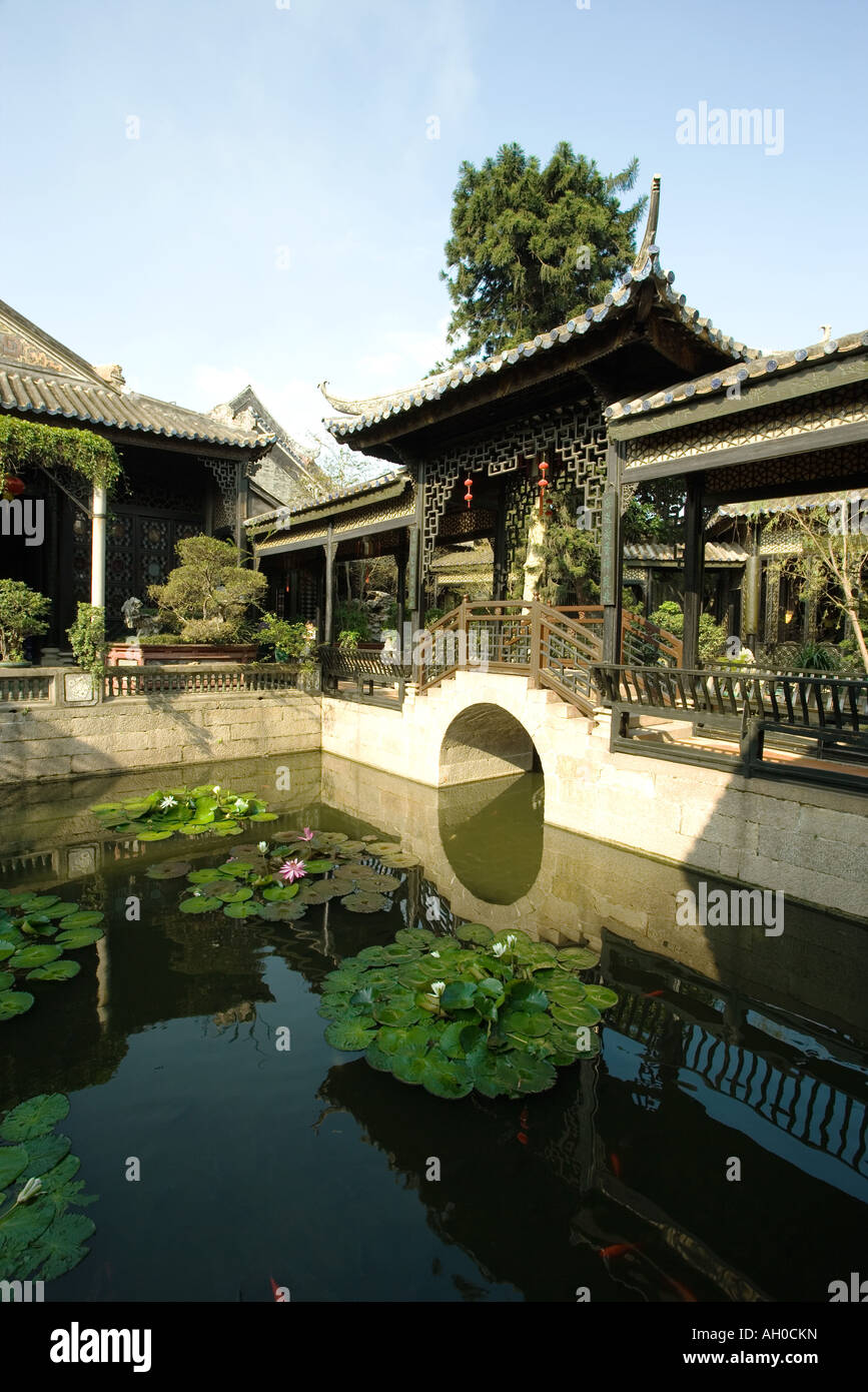 Water lily pond in temple courtyard, Guangdong province, China Stock Photo